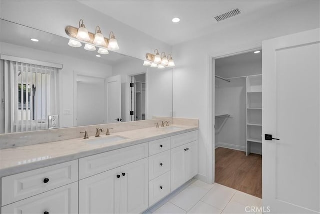 bathroom featuring vanity and tile patterned floors