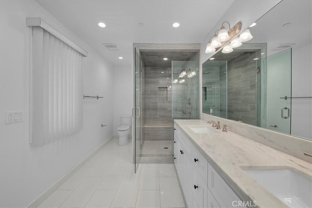 bathroom with vanity, an enclosed shower, tile patterned floors, and toilet