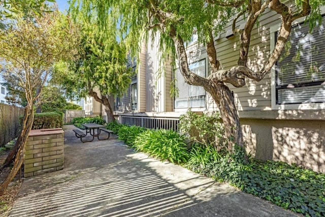 view of property's community featuring a patio