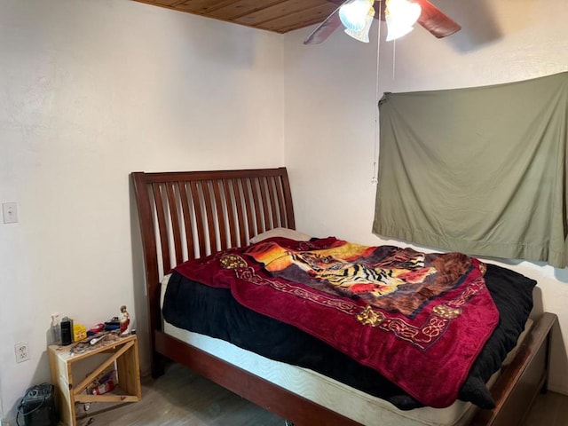 bedroom with wood ceiling, ceiling fan, and hardwood / wood-style floors