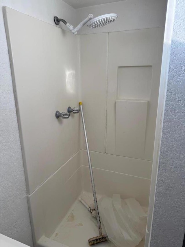 bathroom with walk in shower