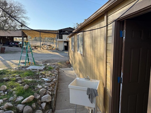 view of patio / terrace with a carport