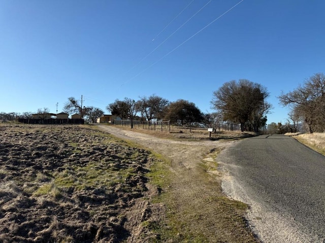 view of road with a rural view