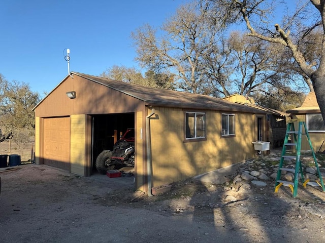 view of outdoor structure with a garage