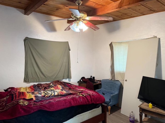 bedroom featuring ceiling fan, wooden ceiling, beam ceiling, and light hardwood / wood-style flooring