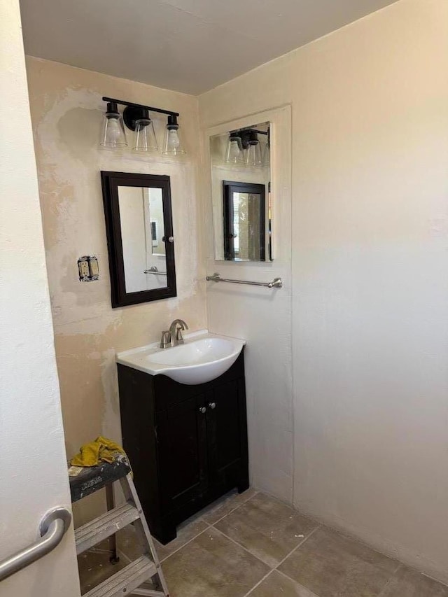 bathroom featuring vanity and tile patterned flooring