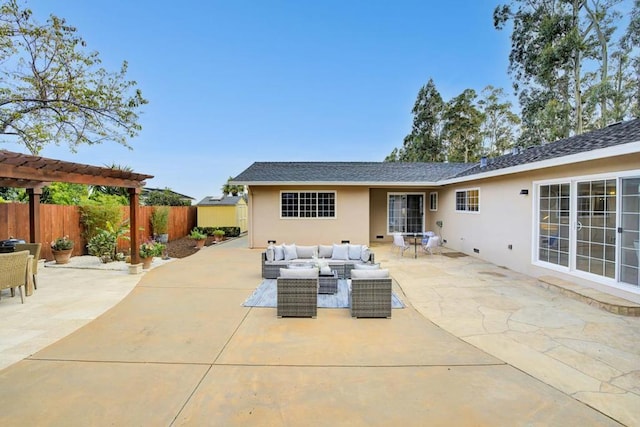 view of patio with a pergola and outdoor lounge area