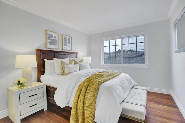 bedroom featuring crown molding and dark hardwood / wood-style flooring