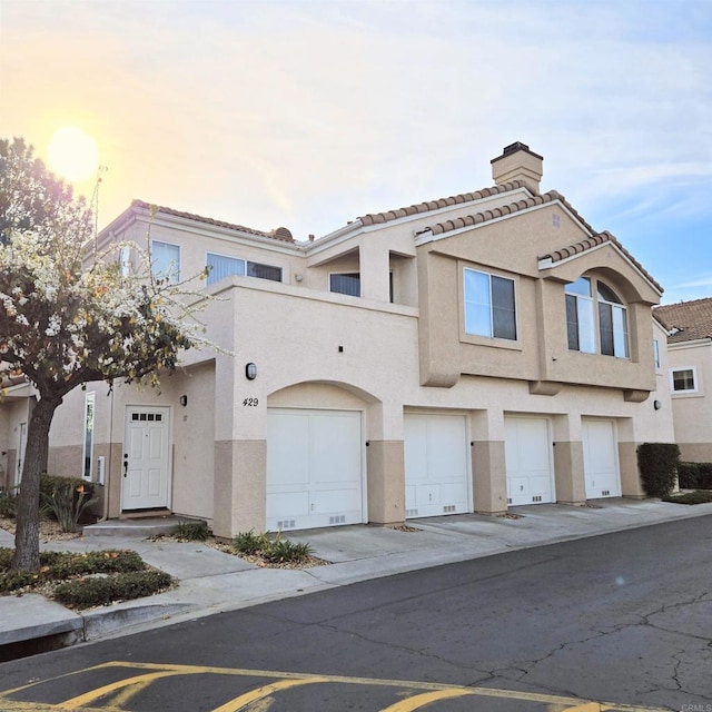 view of front of property featuring a garage