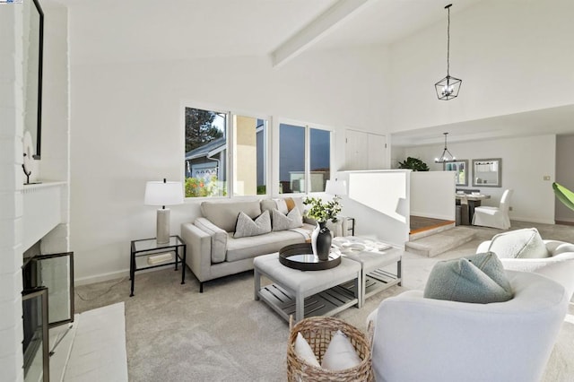 carpeted living room featuring beam ceiling, high vaulted ceiling, and a chandelier