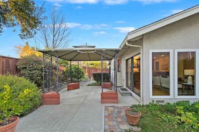 view of patio featuring a gazebo