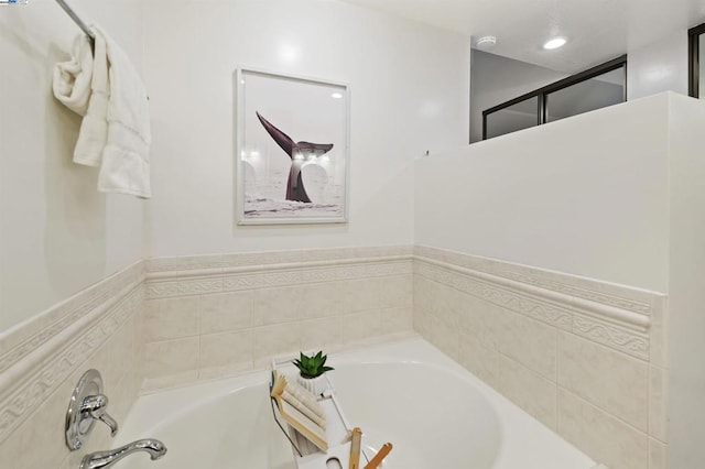 bathroom featuring a tub