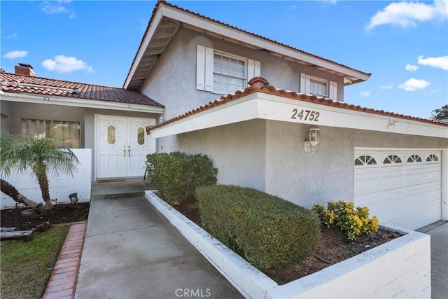 view of front of property featuring a garage