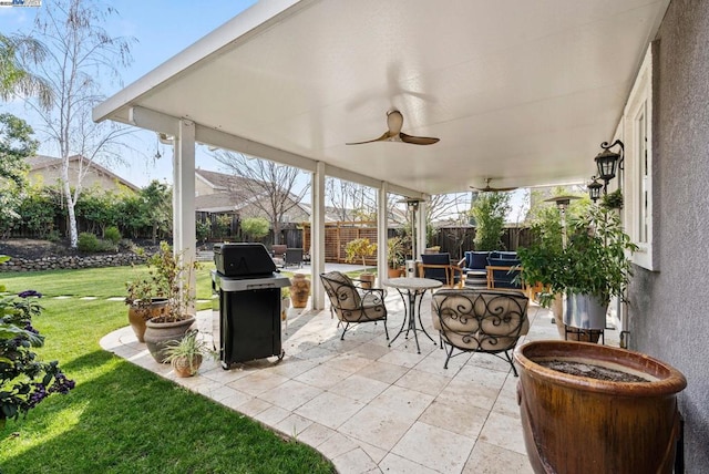 view of patio / terrace with ceiling fan, area for grilling, and outdoor lounge area