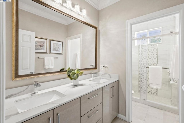 bathroom with crown molding, vanity, tile patterned floors, and walk in shower