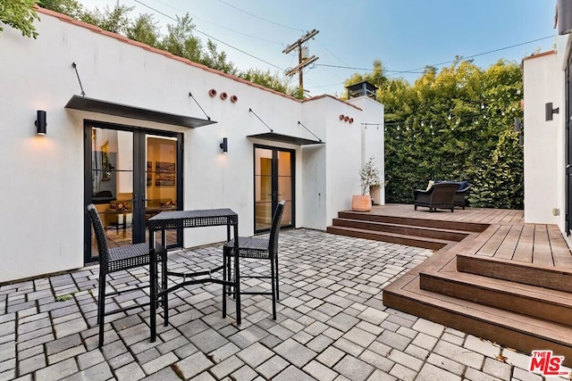 view of patio featuring french doors