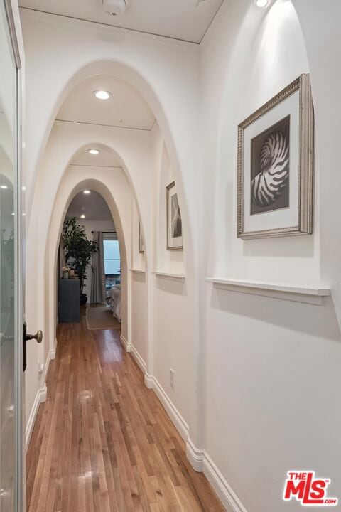 hallway featuring hardwood / wood-style floors