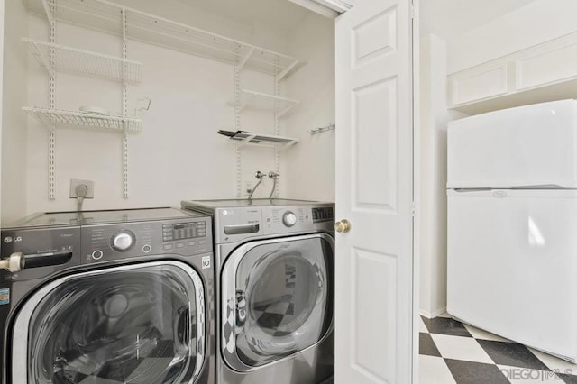 washroom featuring separate washer and dryer