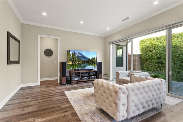 living room with ornamental molding and wood-type flooring