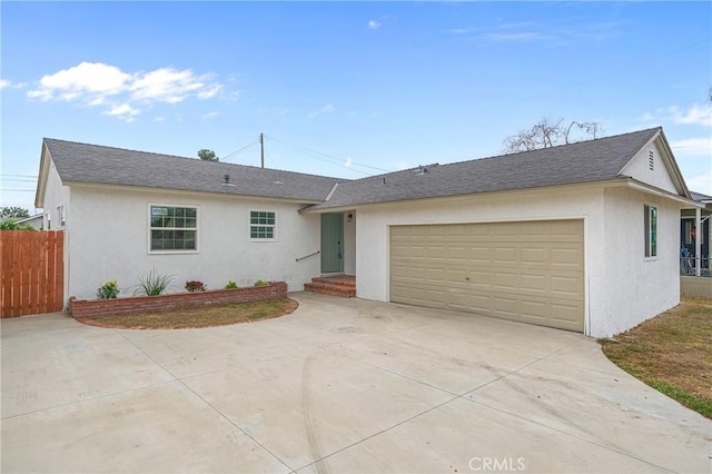 single story home with a garage