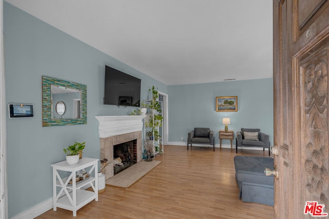 living room with light hardwood / wood-style floors