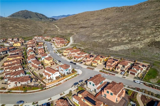 drone / aerial view featuring a mountain view