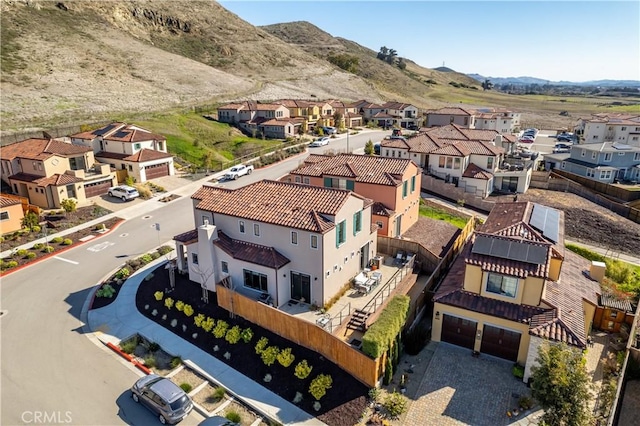 drone / aerial view featuring a mountain view