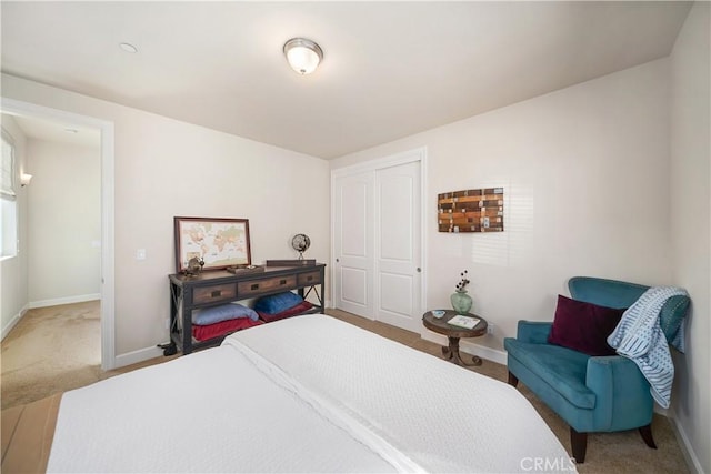 bedroom featuring a closet and carpet