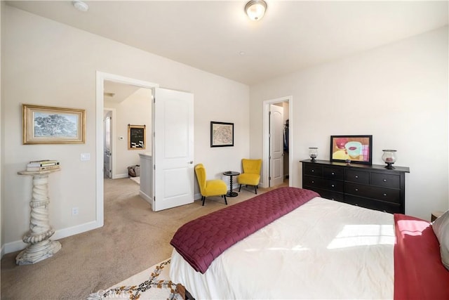 bedroom with light colored carpet