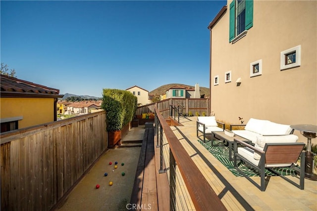 view of patio / terrace with outdoor lounge area and a mountain view