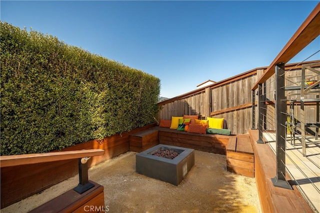 view of patio featuring a fire pit