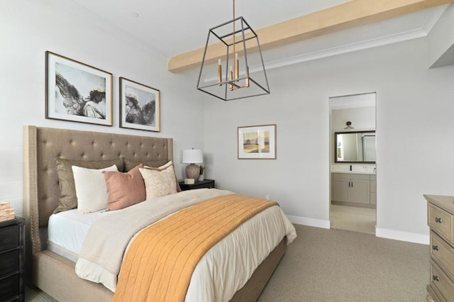 carpeted bedroom featuring crown molding, connected bathroom, and beam ceiling