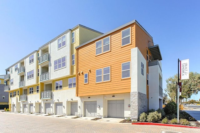 view of building exterior with a garage