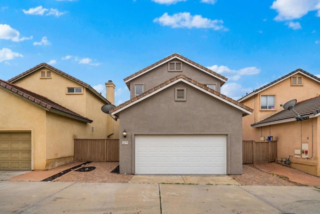 front of property featuring a garage