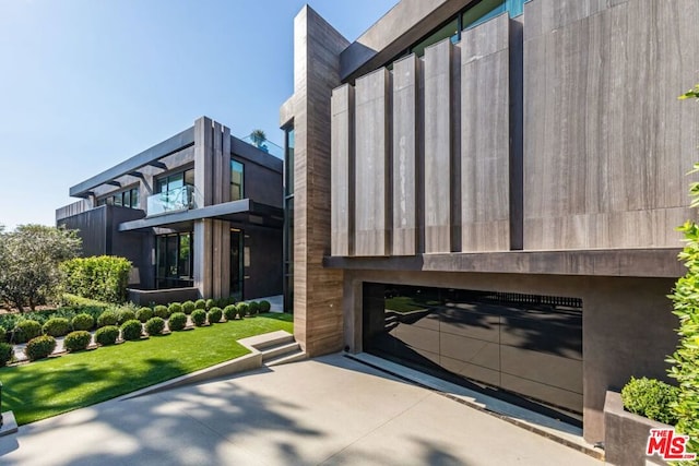 view of property exterior with a garage