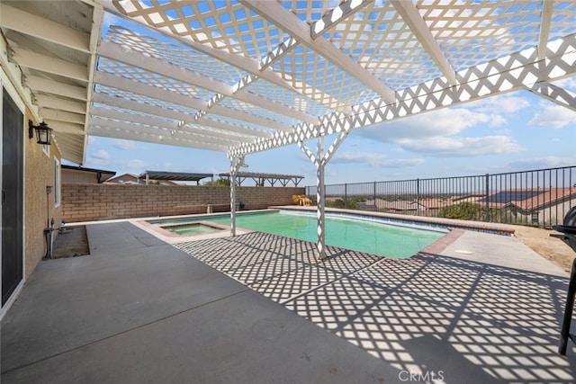 view of swimming pool featuring an in ground hot tub, a patio area, and a pergola