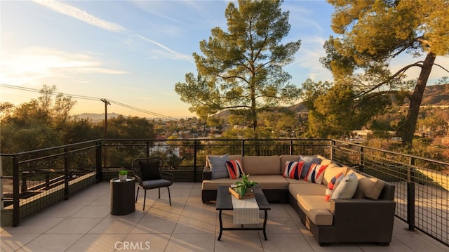 patio terrace at dusk with outdoor lounge area