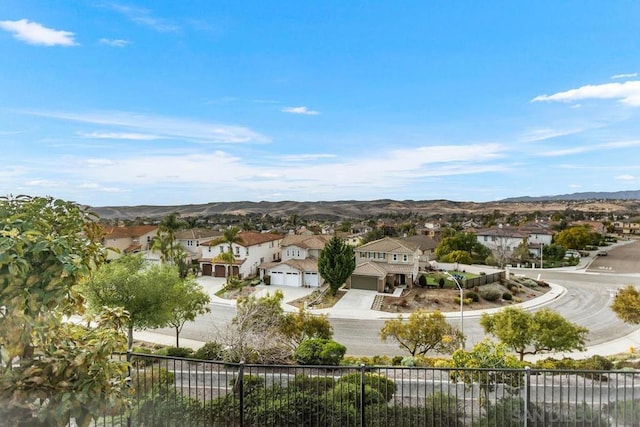 birds eye view of property featuring a mountain view