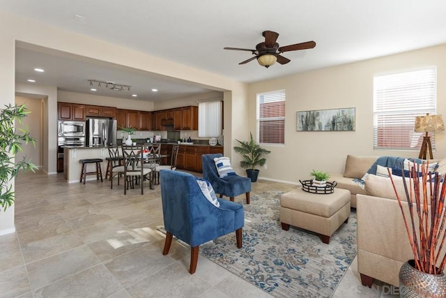 living room featuring ceiling fan