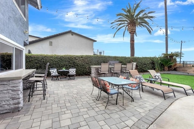 view of patio featuring a bar