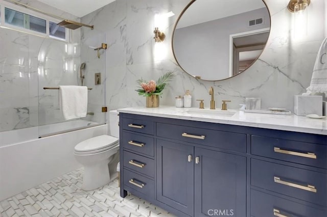 26481 Montebello Pl, Mission Viejo, CA 92691 - bathroom featuring vanity, toilet, tile walls, visible vents, and bath / shower combo with glass door