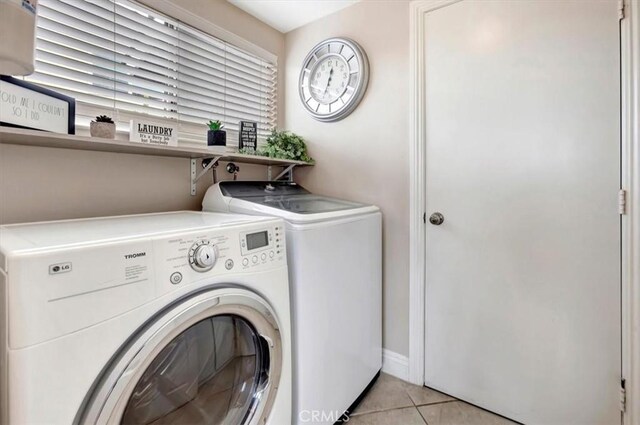 26481 Montebello Pl, Mission Viejo, CA 92691 - clothes washing area with laundry area, light tile patterned flooring, and washing machine and clothes dryer