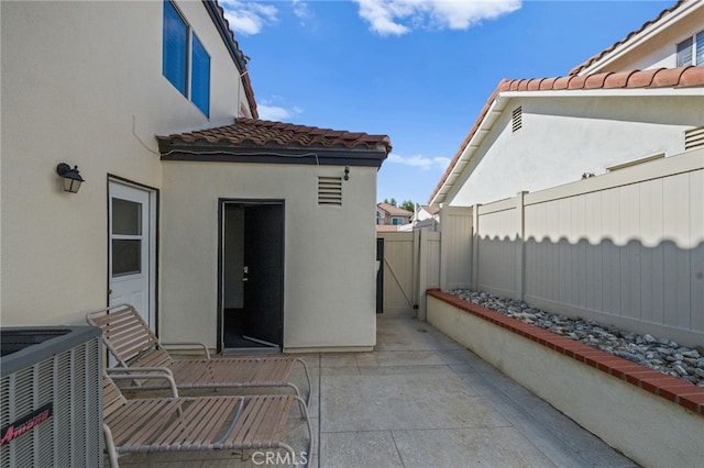 view of patio / terrace featuring central AC unit