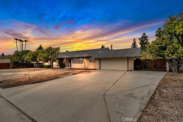 ranch-style home featuring a garage