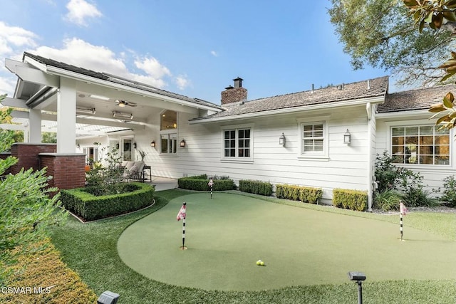 rear view of house with a patio