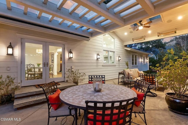 view of patio / terrace with outdoor lounge area, ceiling fan, and french doors