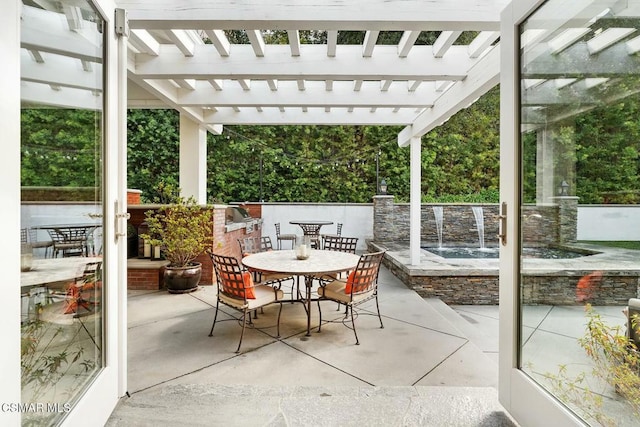 view of patio / terrace featuring a pergola