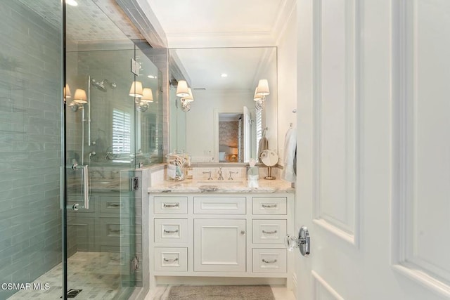 bathroom with vanity, ornamental molding, and walk in shower