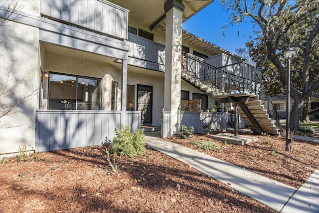 exterior space featuring a balcony