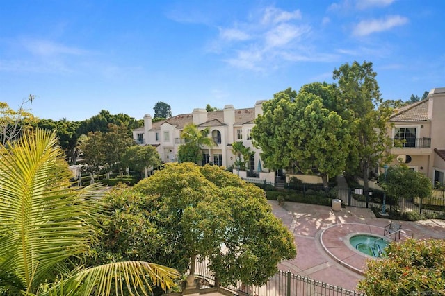 view of community featuring a jacuzzi